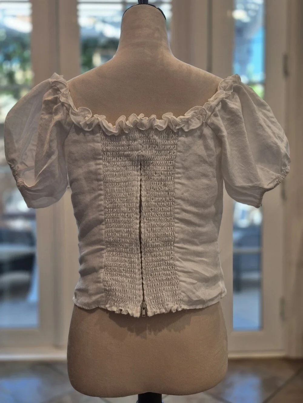 Reformation feminine square